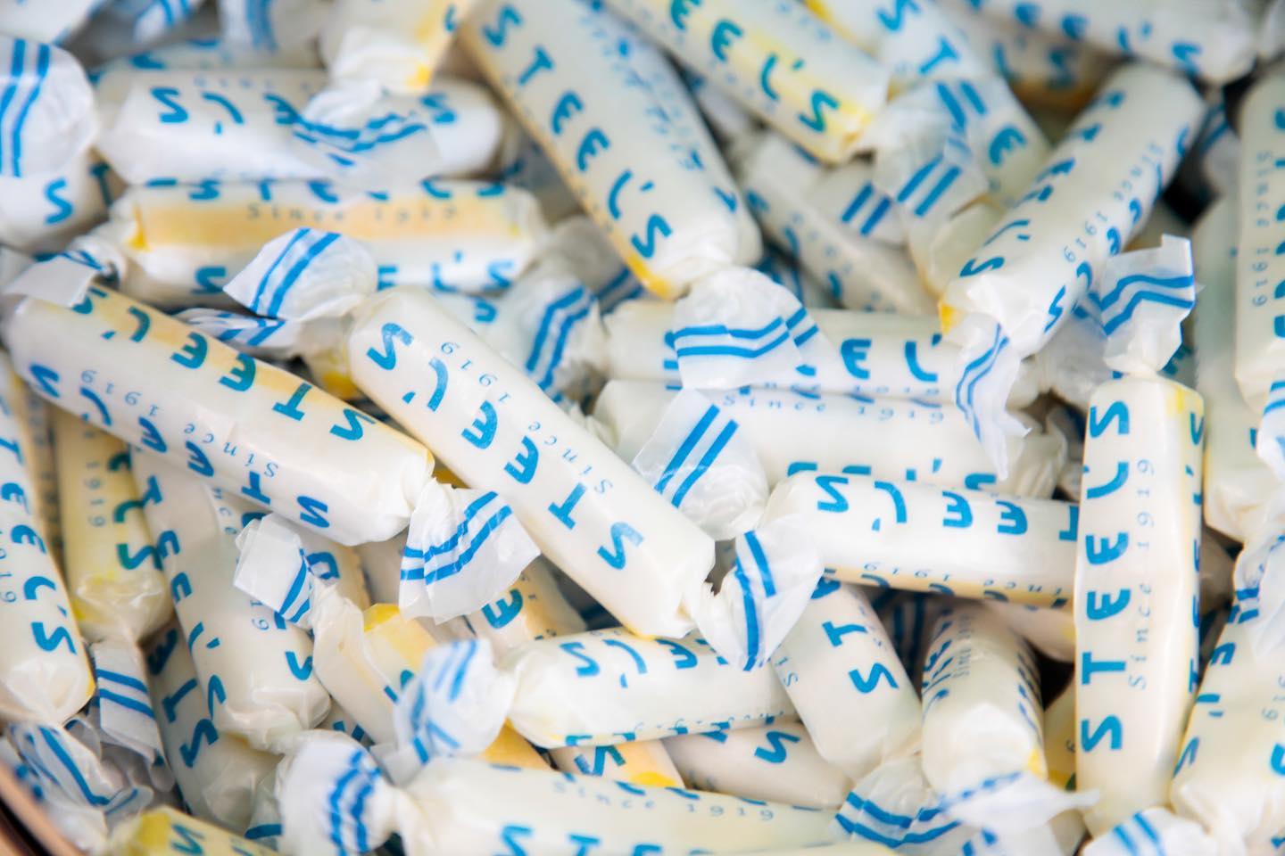 A pile of white and blue candy sticks.