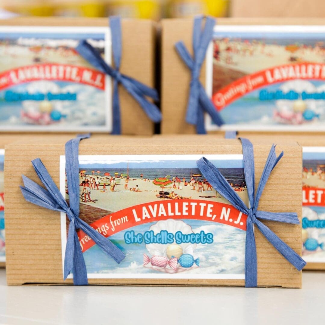 A group of boxes with blue ribbon around them.