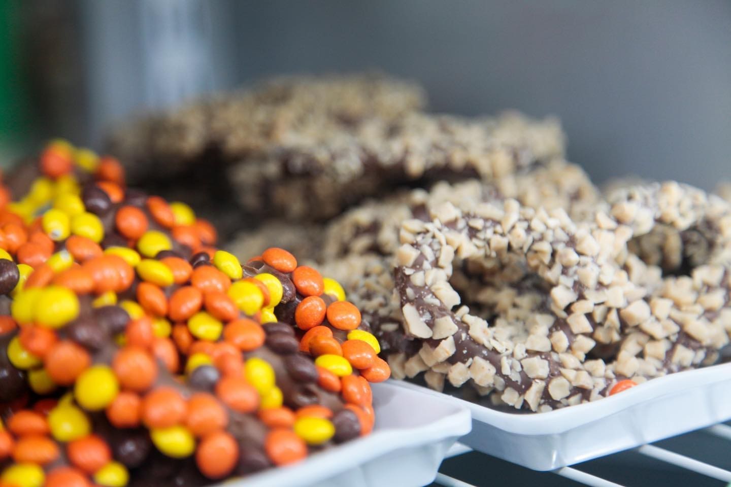A close up of several different types of donuts