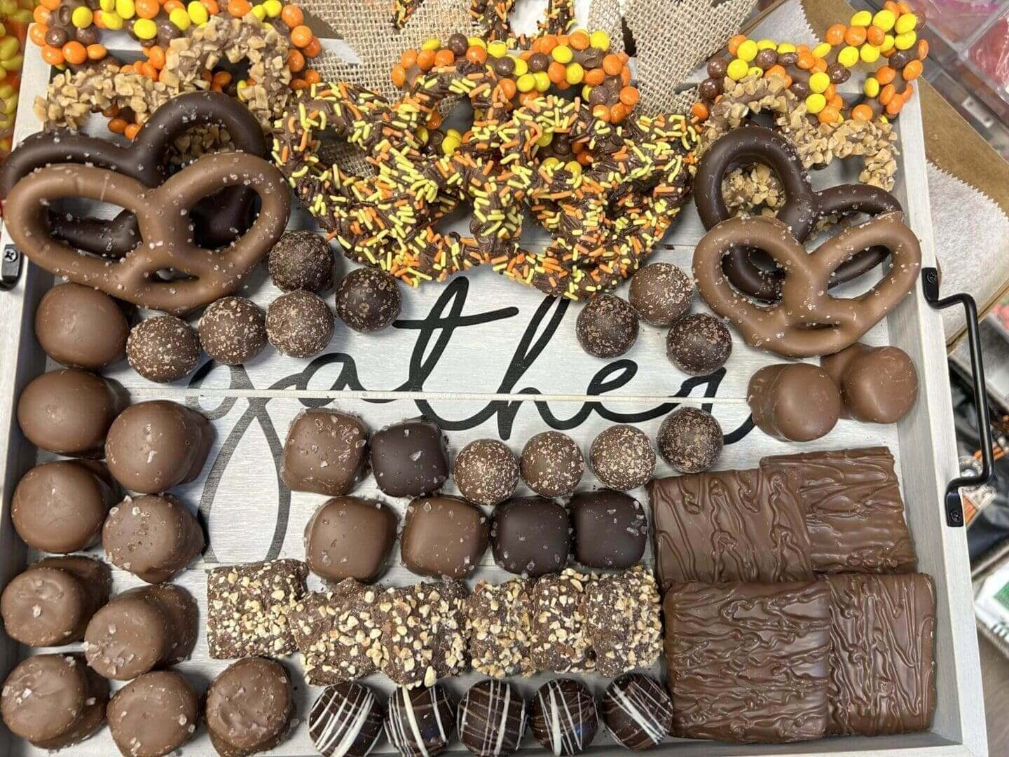 A table topped with lots of different types of treats.