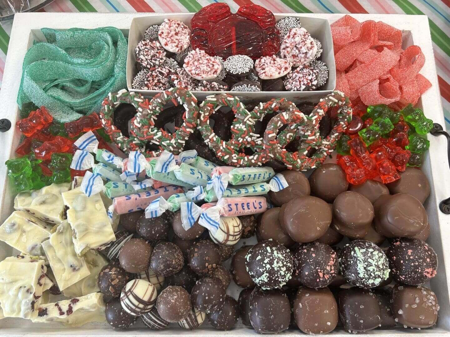 A table filled with lots of different types of candy.