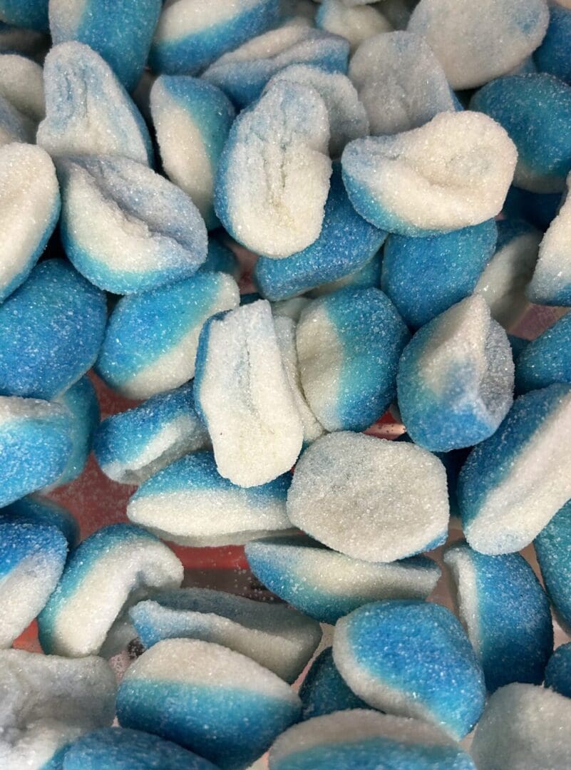 Colorful blue and white soft foam pieces clustered together.