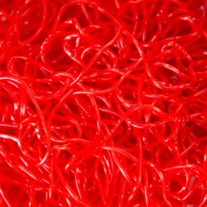 A close up of red shredded paper