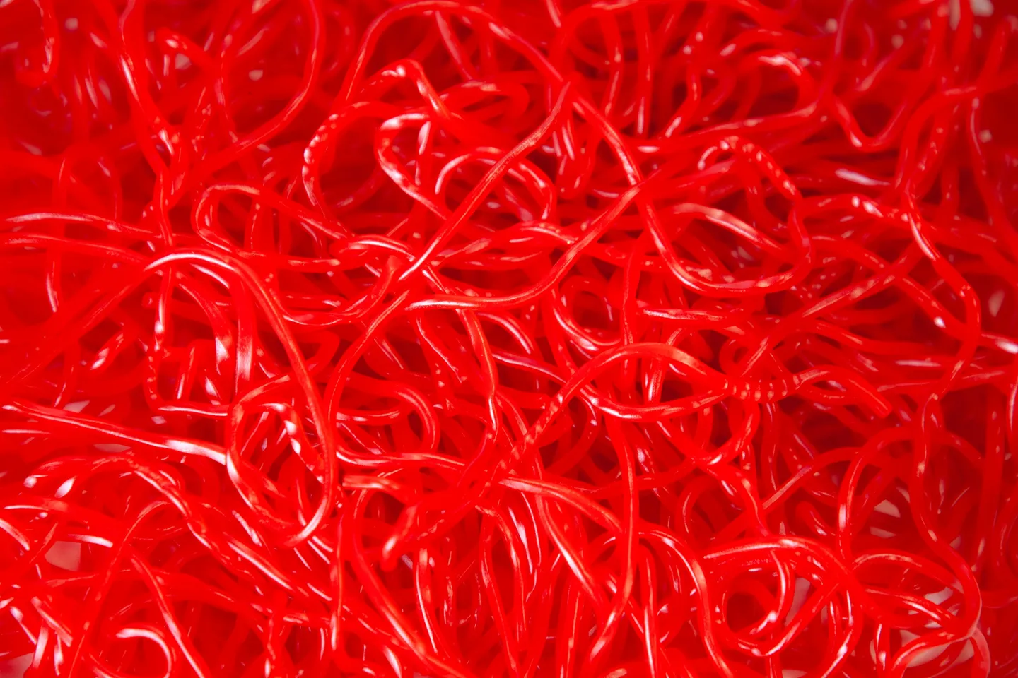 A close up of red shredded paper