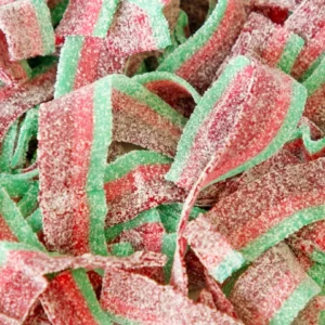 A close up of some green and red candy