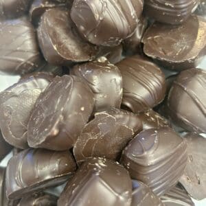 Close-up of shiny, metallic chocolate-covered candies.
