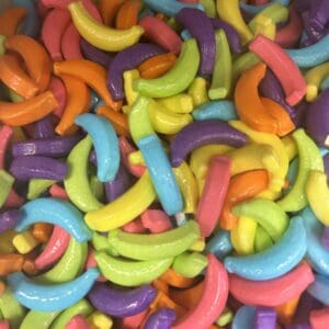 Colorful, curved, candy-like objects densely packed together.