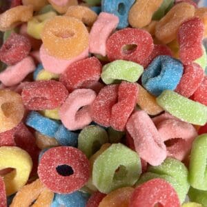 Colorful fruit-flavored cereal loops in various bright colors.
