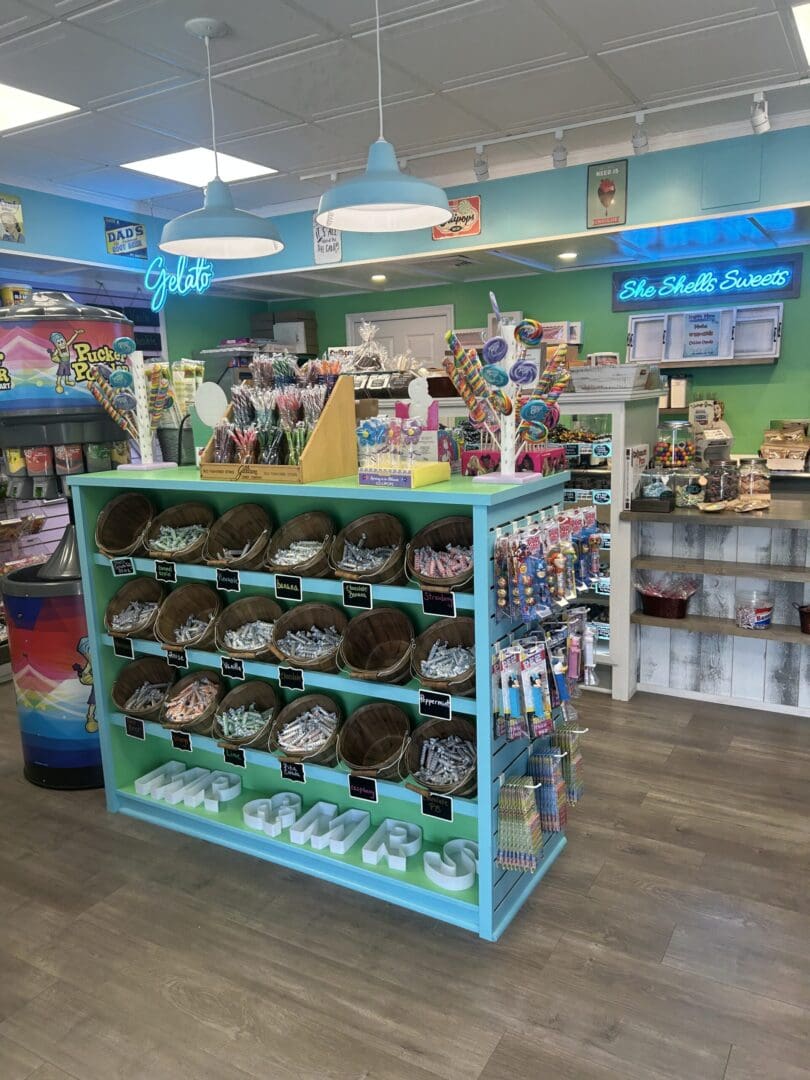 Colorful pet store aisle with treats and toys on display.
