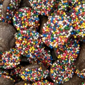 Chocolate-covered treats with colorful sprinkles.