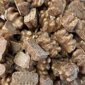Close-up of broken chocolate pieces with crunchy wafer layers.