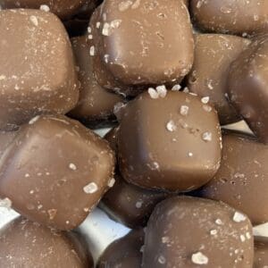 Close-up of salted chocolate caramel squares.