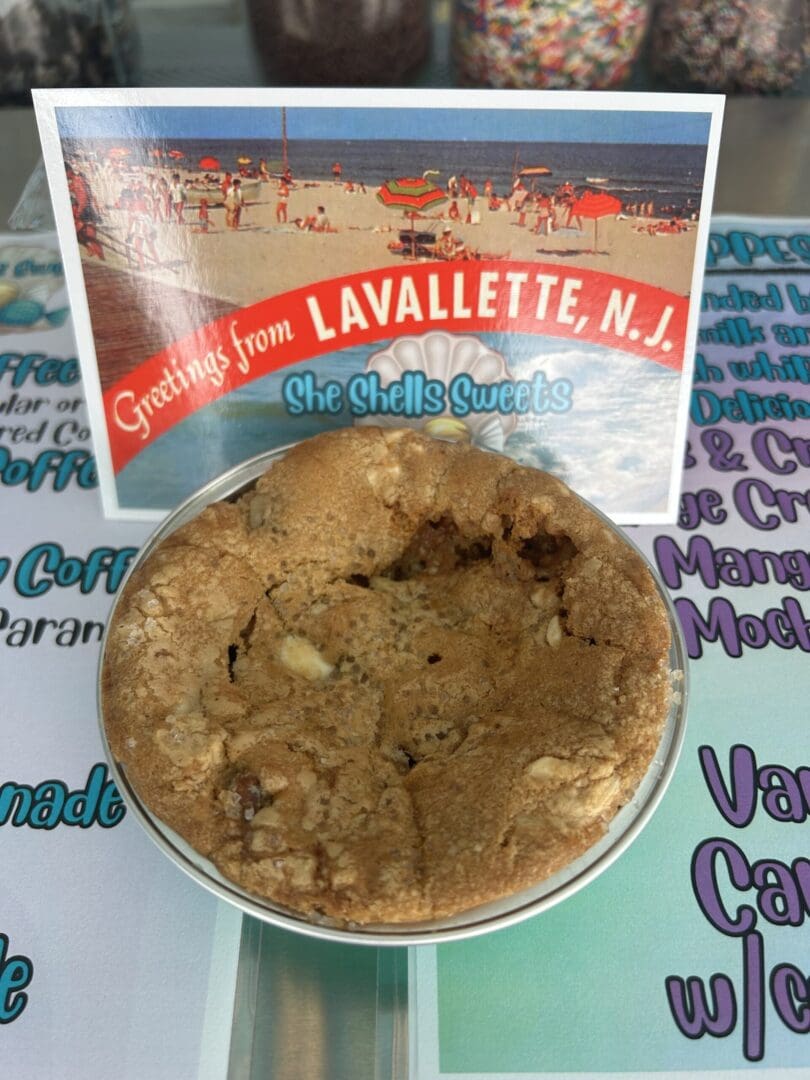 A large cookie from Lavallette, NJ in a tin.