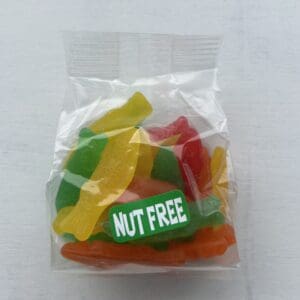 A small clear packet of colorful gummy bears labeled 