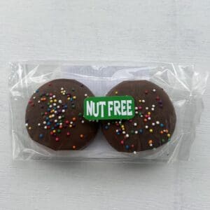 Chocolate treats labeled nut free with colorful sprinkles.