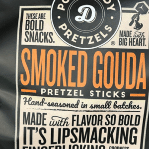 Package of smoked gouda cheese sticks with bold, flavorful branding.