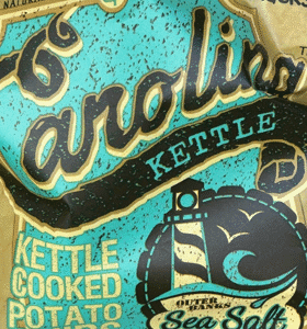 Close-up of vintage Carolina kettle-cooked potato chip bags with retro design.