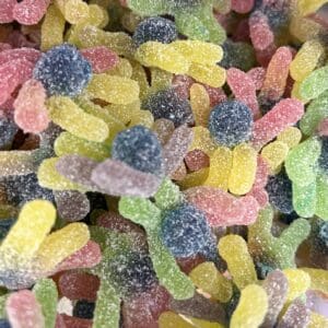 Colorful sour gummy worms piled together.