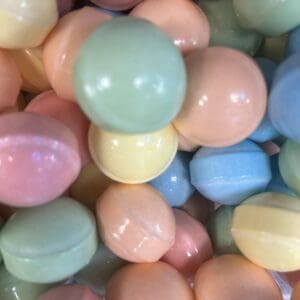 Close-up of pastel-colored candy-coated almonds.